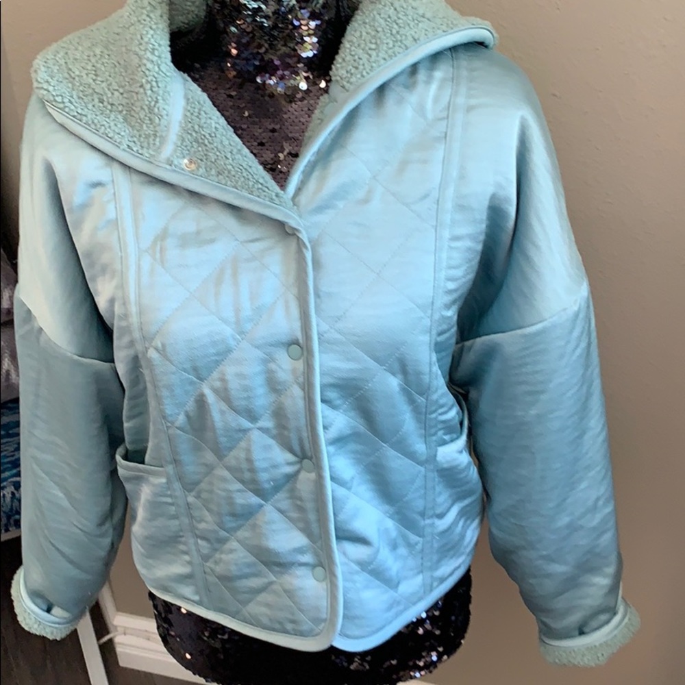 Gorgeous hooded pale blue jacket for fall.